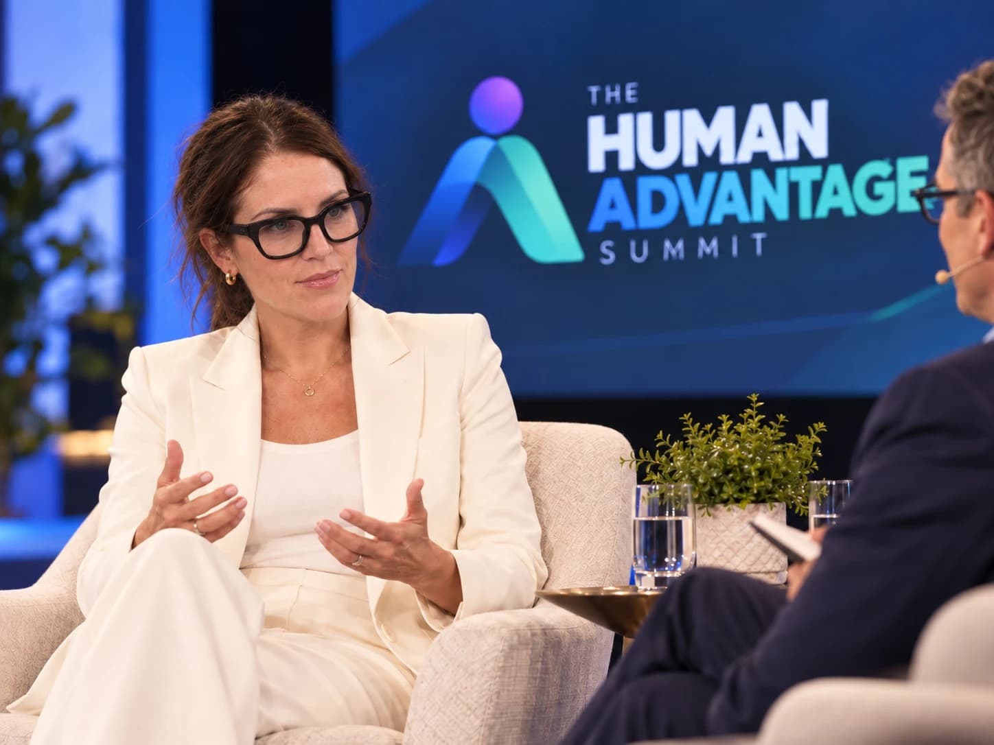 Finesse Blumenthal speaking on stage at The Human Advantage Summit